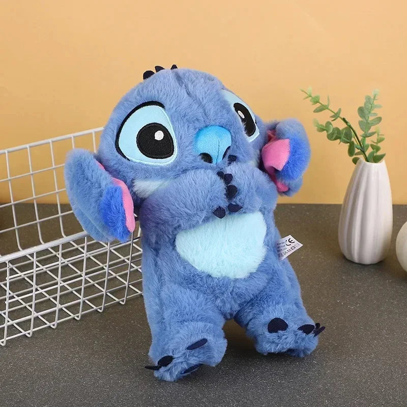 Peluche Stitch respirante avec berceuse apaisante
