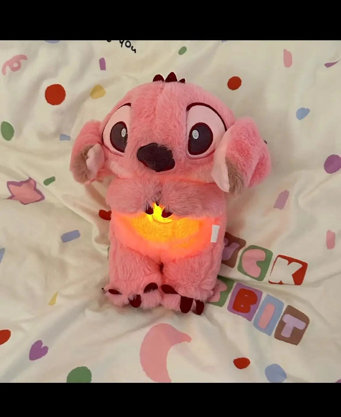Peluche Stitch respirante avec berceuse apaisante